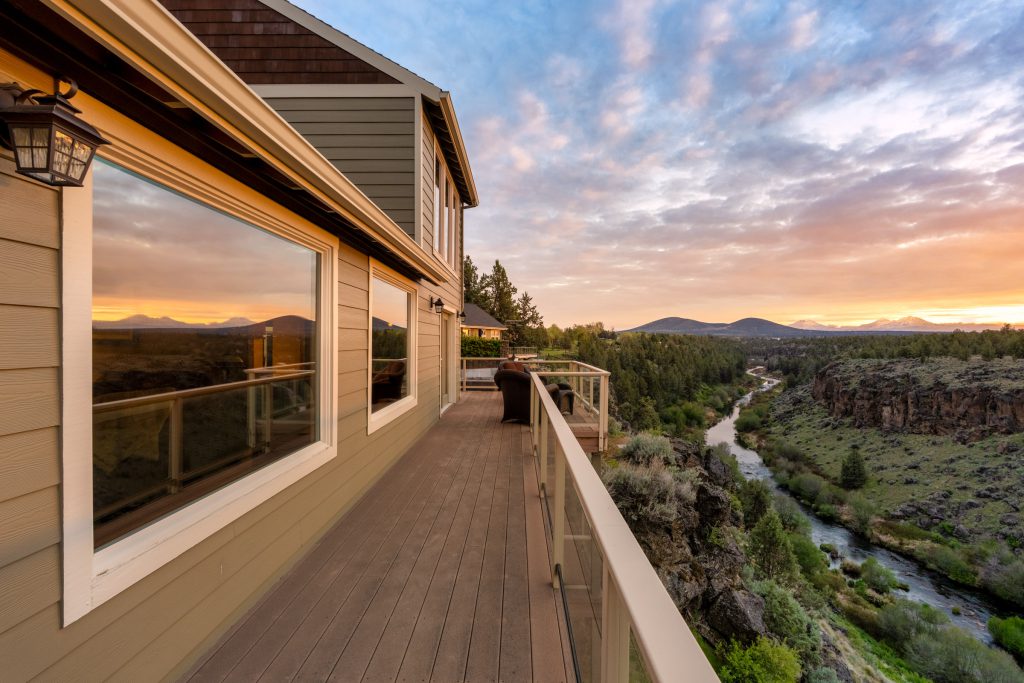 Twilight deck and Cascades canyon view in Bend, Oregon — Central Oregon real estate photography by Wasim