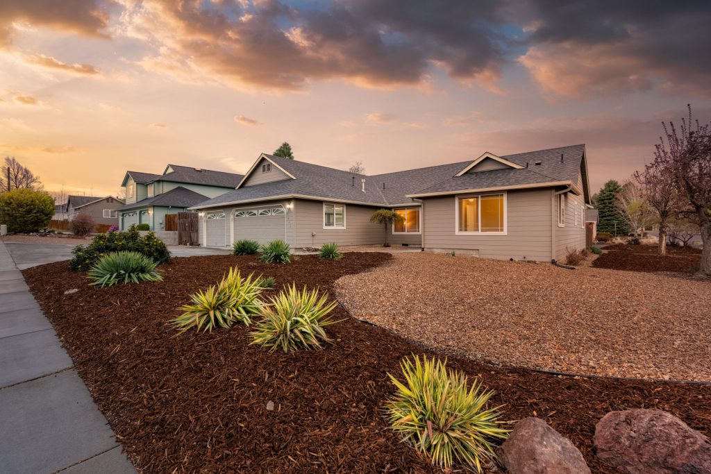 Twilight xeriscape front yard of a Bend, Oregon home — Central Oregon real estate photography by Wasim